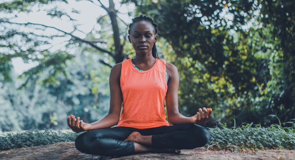 Black woman meditating
