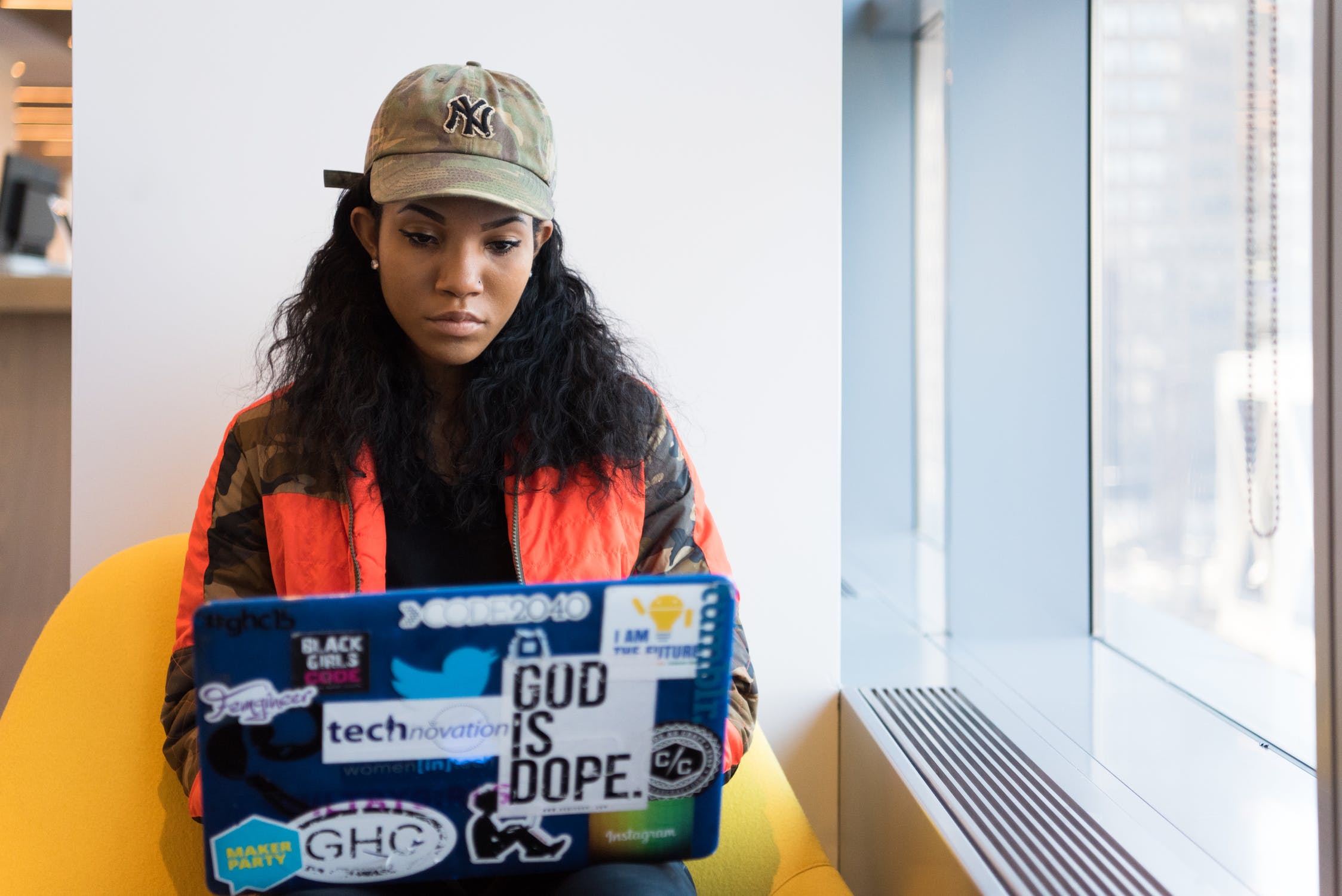 Black woman working on laptop