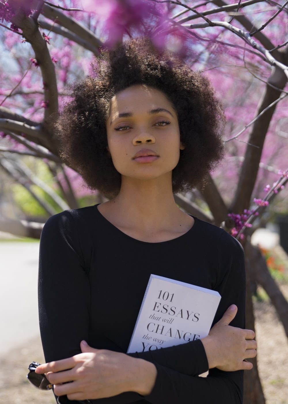african american woman holding book